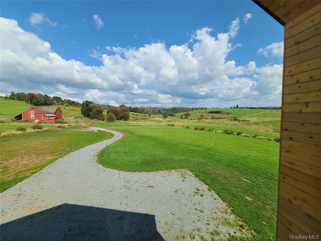 a view of a golf course with a garden