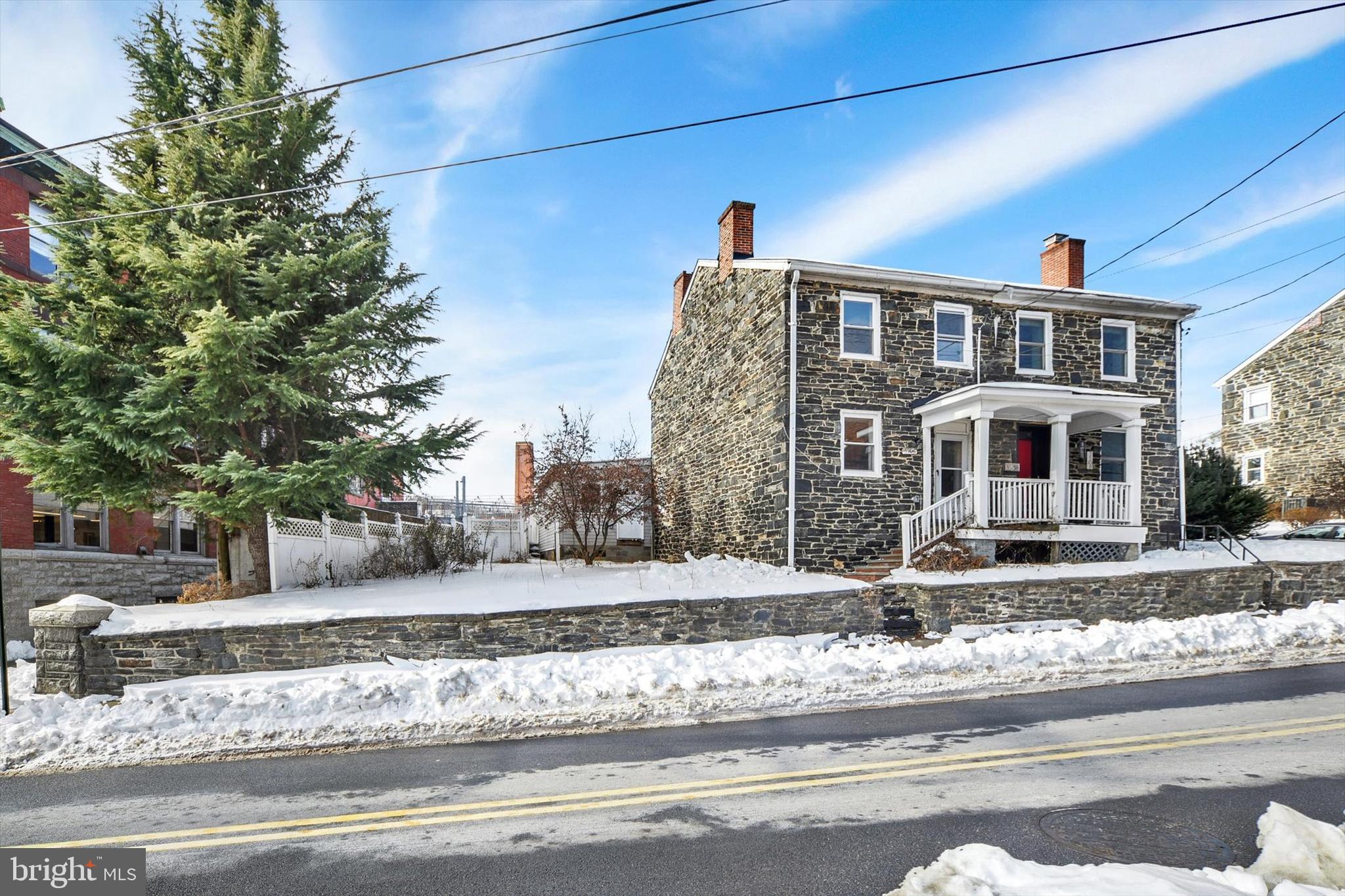 3506 Clipper Road Baltimore, MD 21211 - Photo 4 of 5 a front view of a house with a yard