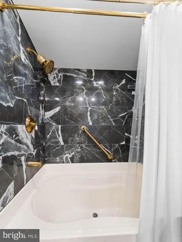 a bathroom with a bathtub