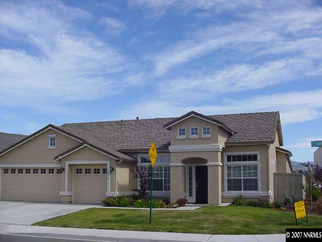1810 Arboleda Court Reno, NV 89521 - Photo 1 of 9 front view of a house with a yard