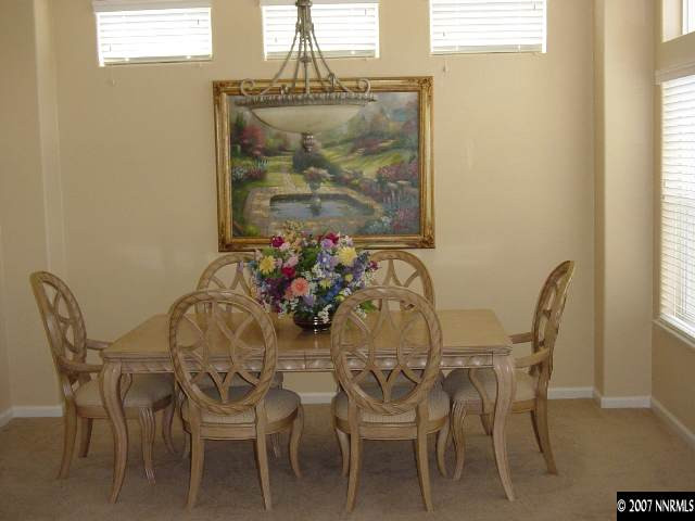 1810 Arboleda Court Reno, NV 89521 - Photo 2 of 9 a dining room with furniture and window
