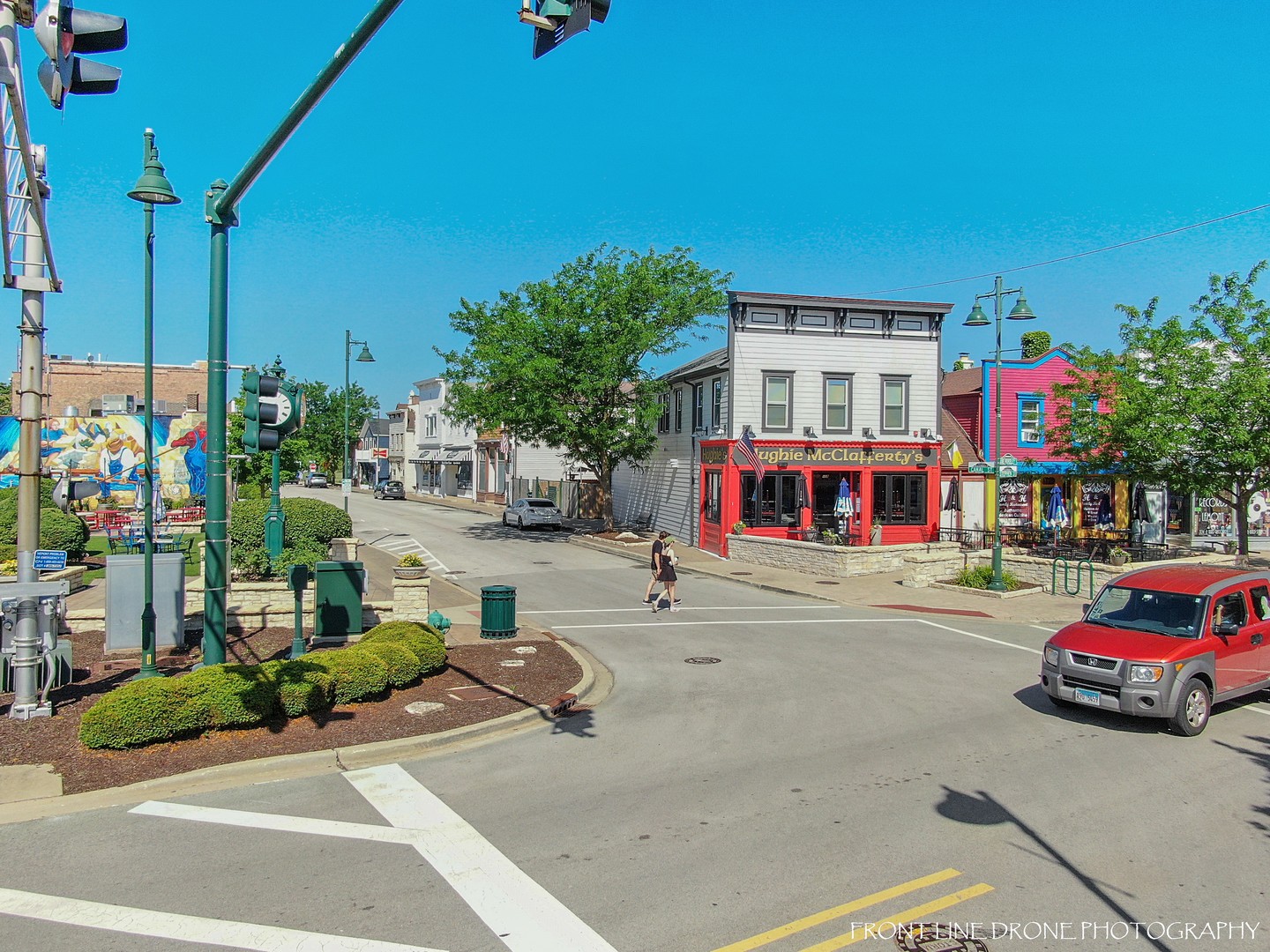 824 State Street Lemont, IL 60439 - Photo 18 of 31 a front view of a building with cars parked