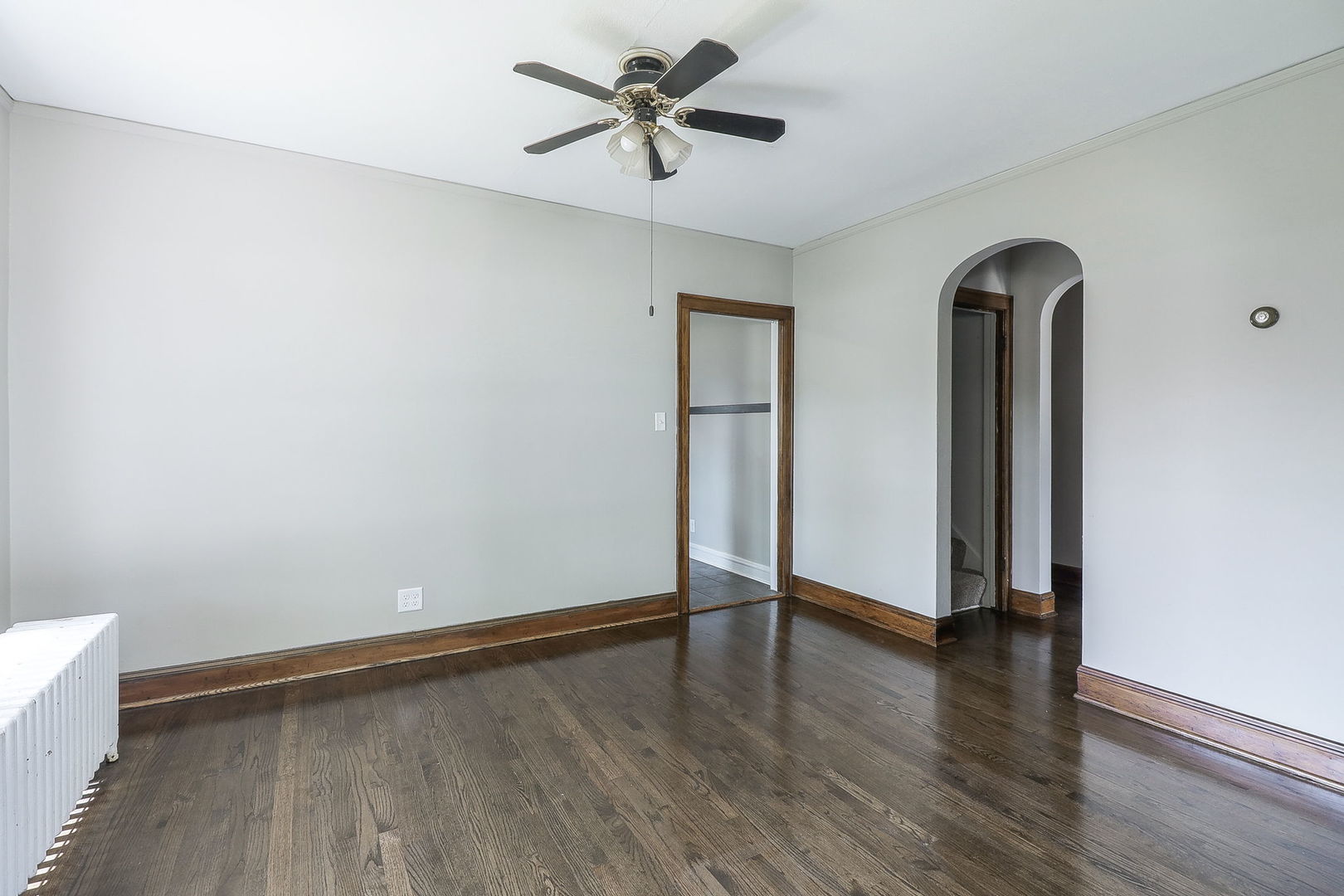 824 State Street Lemont, IL 60439 - Photo 6 of 31 wooden floor in an empty room with a window
