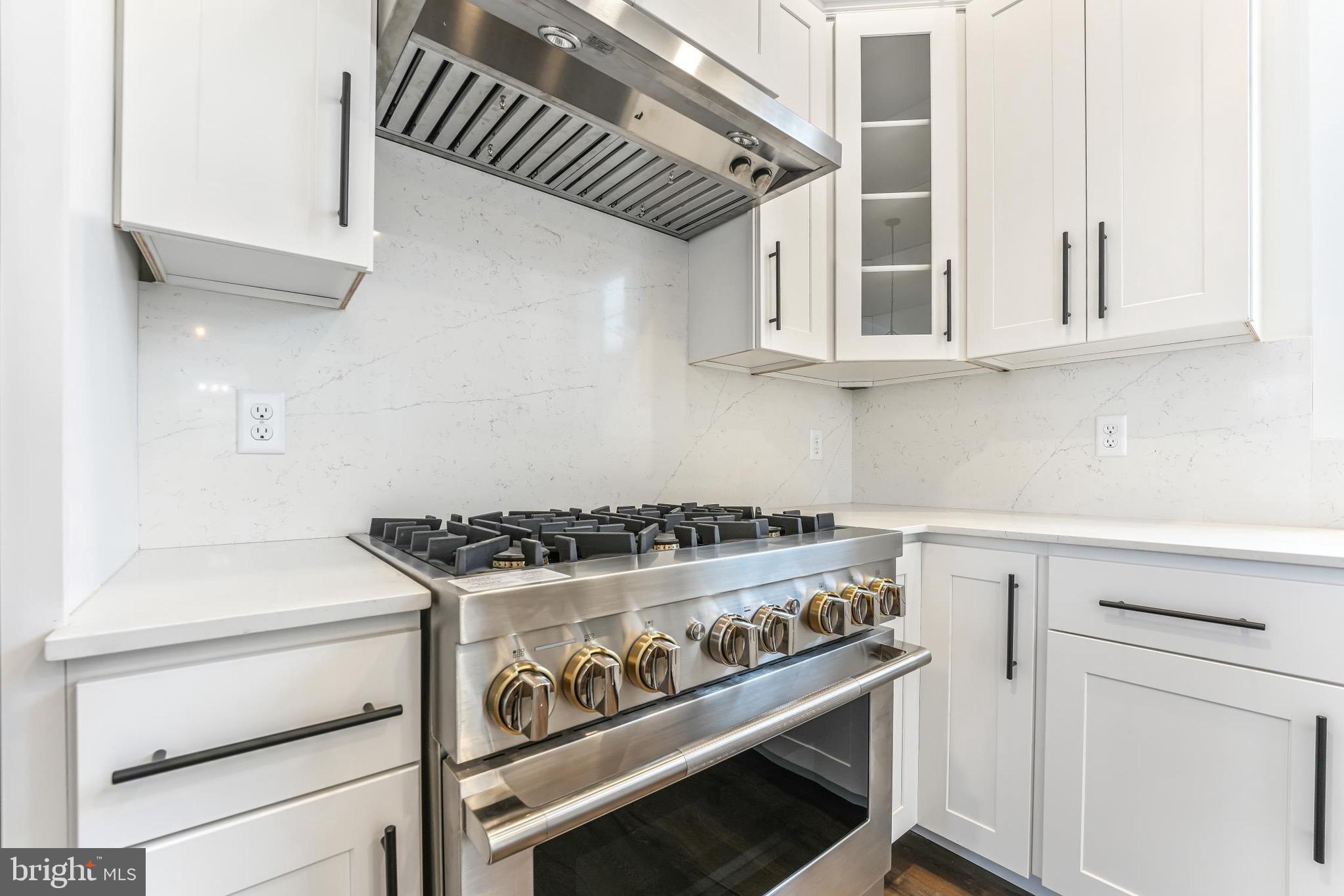 167 Ellicott Road Avondale, PA 19311 - Photo 19 of 54 a stove top oven sitting inside of a kitchen
