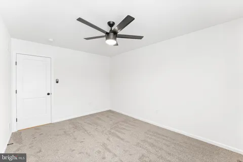 a view of a big room with wooden floor