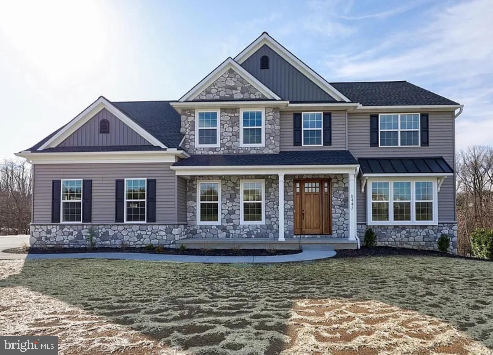 167 Ellicott Road Avondale, PA 19311 - Photo 54 of 54 a front view of a house with a yard