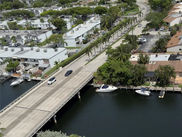 an aerial view of a city with lake view