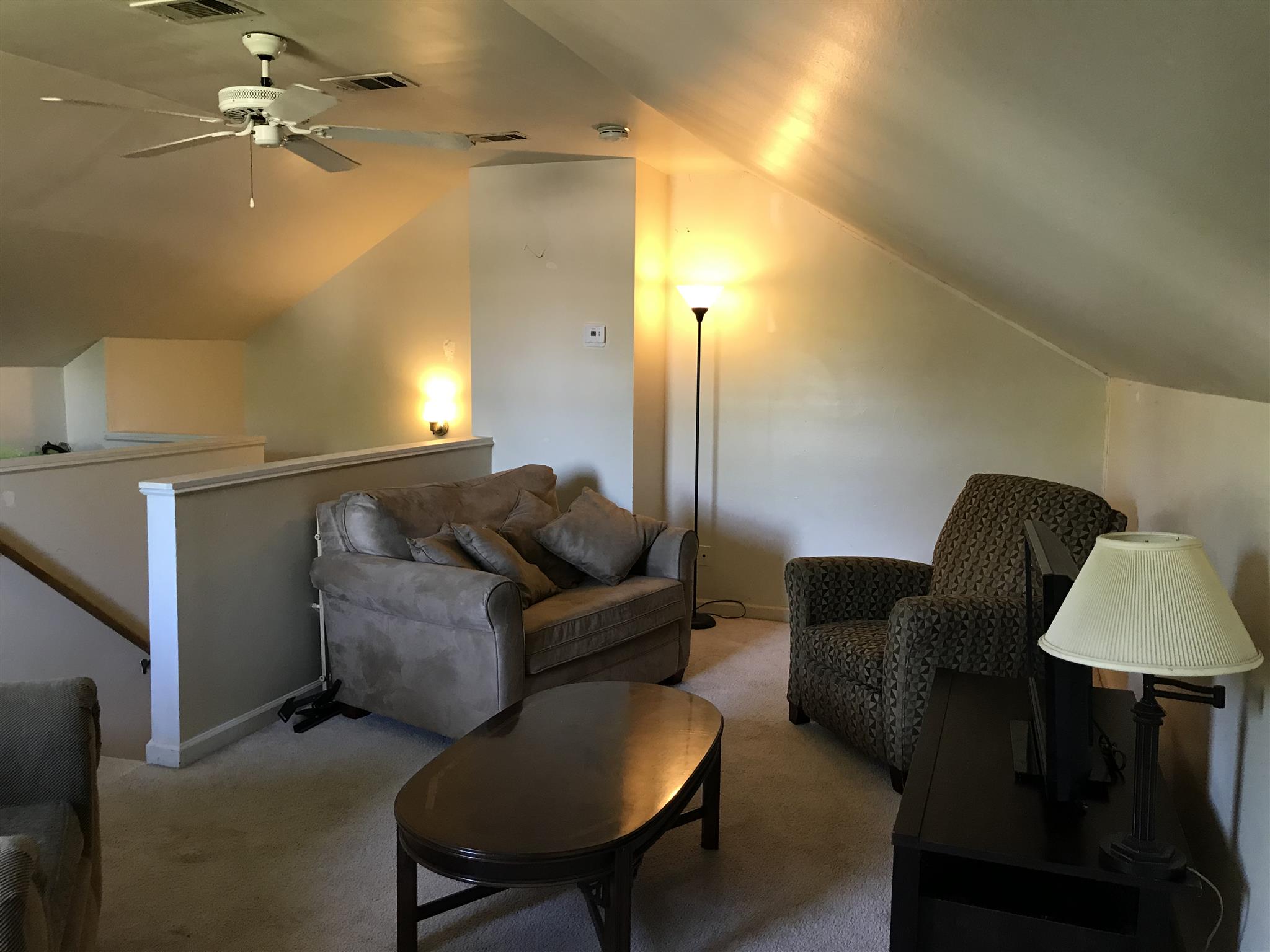 3618 Rutherford Drive Spring Hill, TN 37174 - Photo 15 of 21 a living room with furniture and a lamp