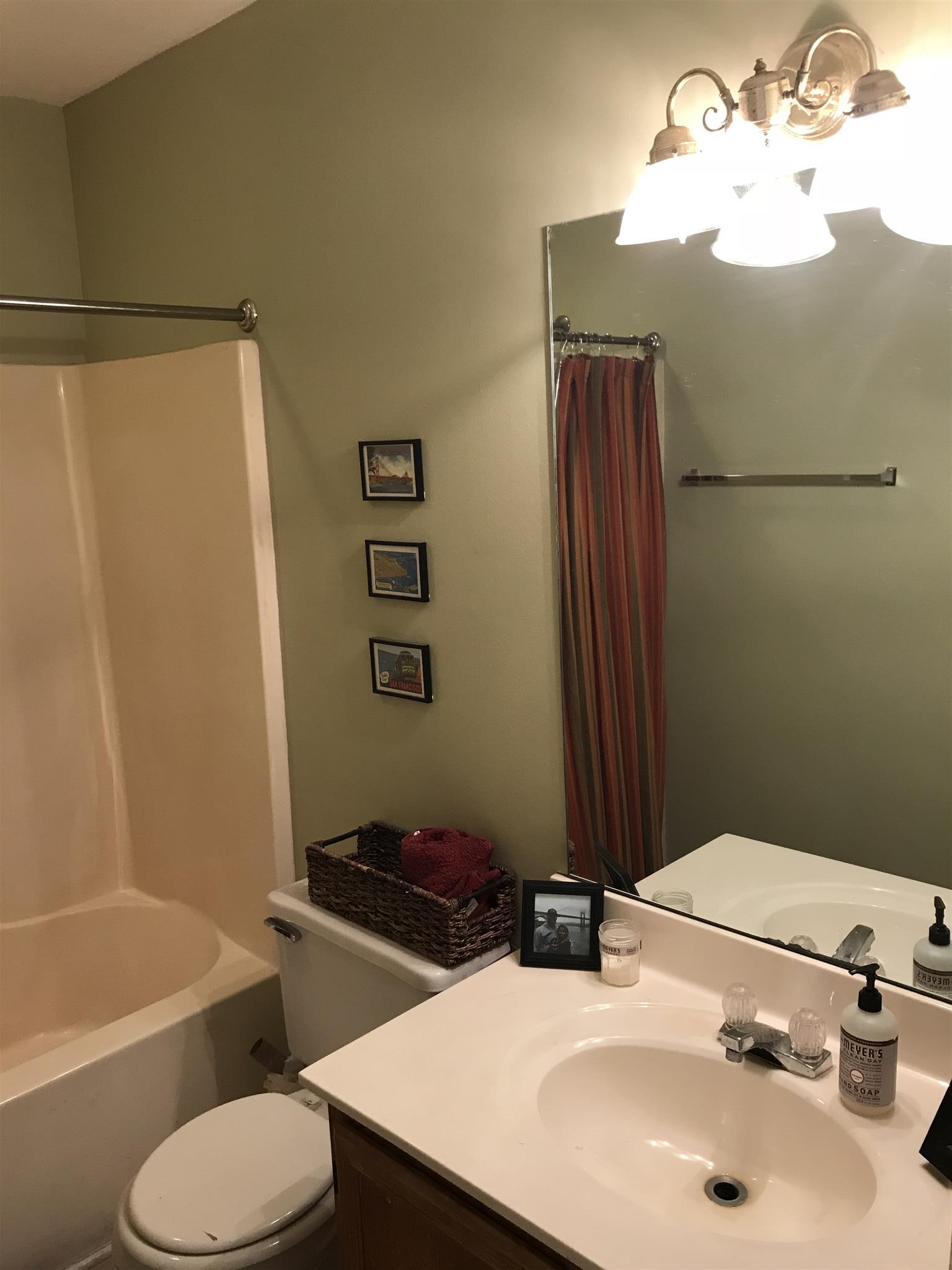 3618 Rutherford Drive Spring Hill, TN 37174 - Photo 20 of 21 a bathroom with a sink toilet and shower