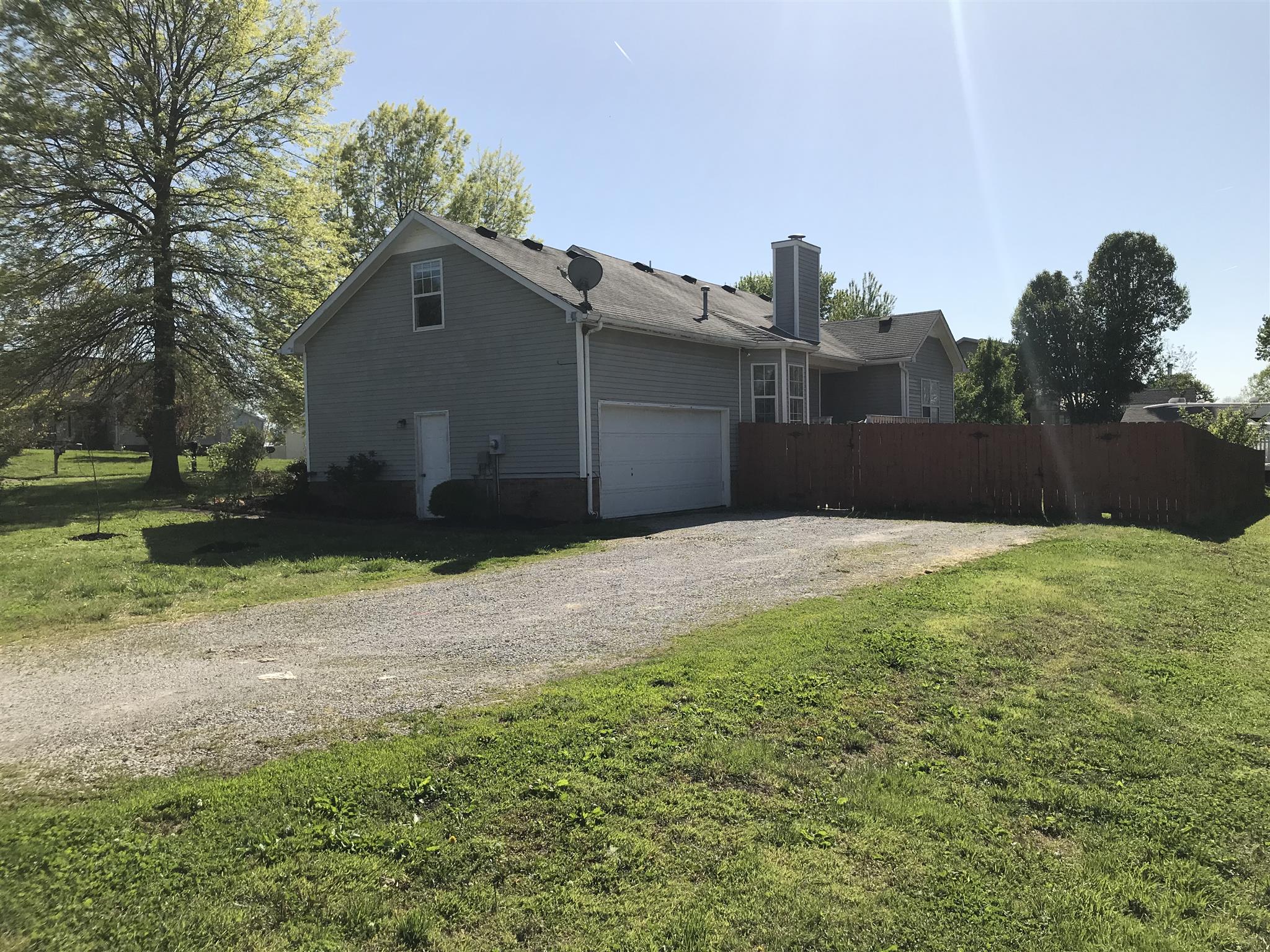 3618 Rutherford Drive Spring Hill, TN 37174 - Photo 5 of 21 a backyard of a house with lots of green space