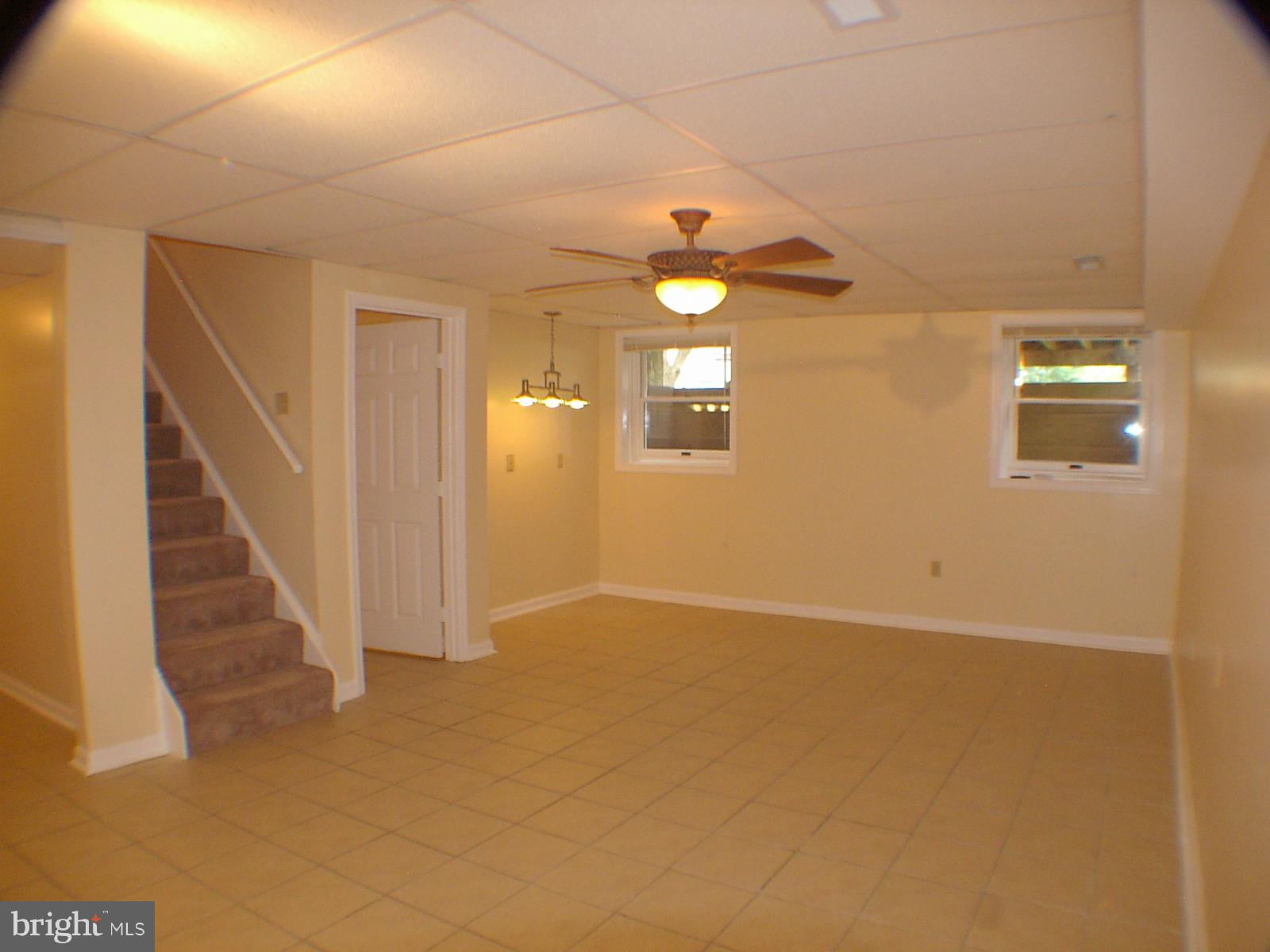 205 Raven Road Stephens City, VA 22655 - Photo 19 of 27 Large Basement Family room. Remote light and fan.