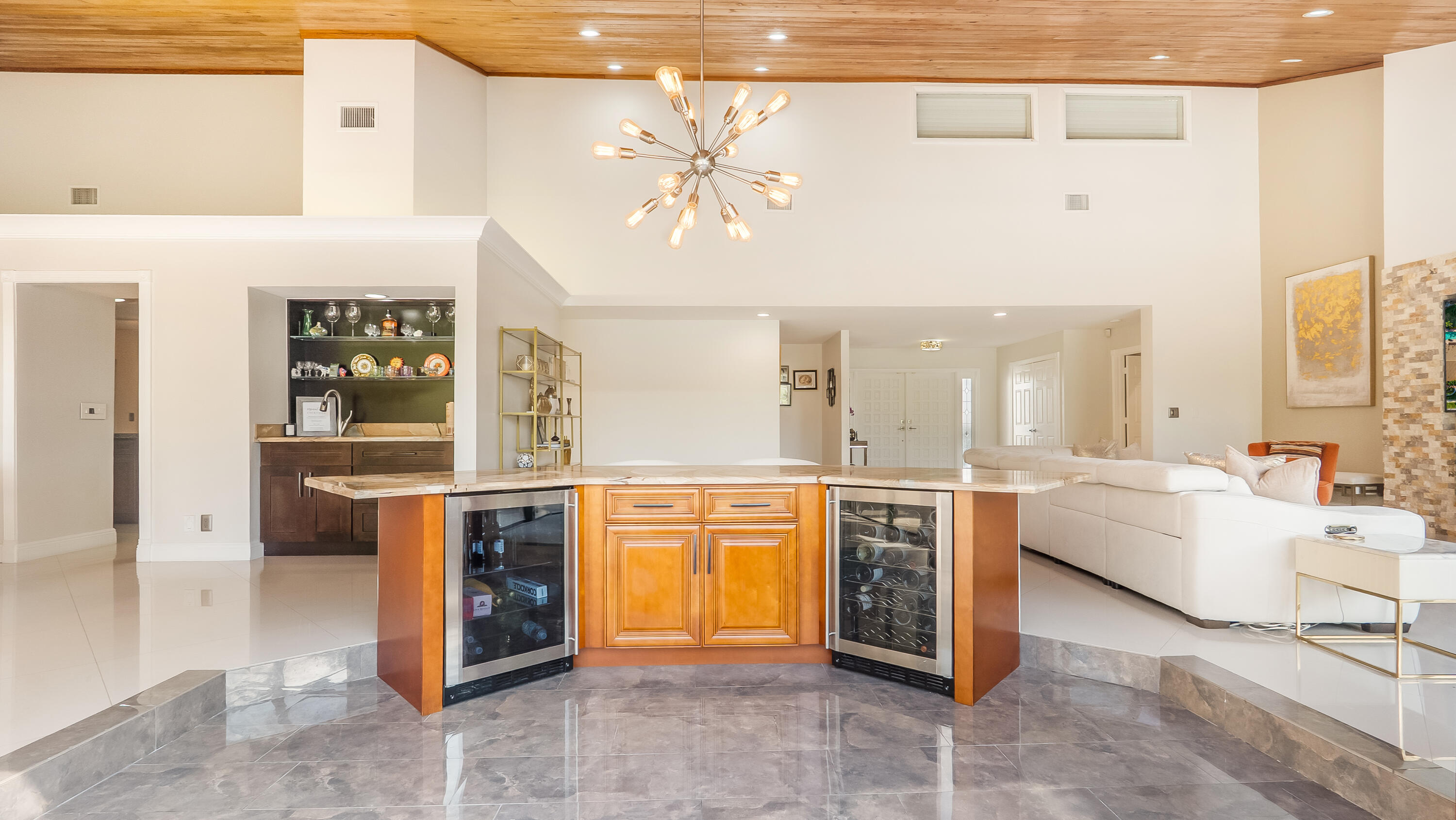10571 Boca Woods Lane Boca Raton, FL 33428 - Photo 11 of 81 a large white kitchen with a large window