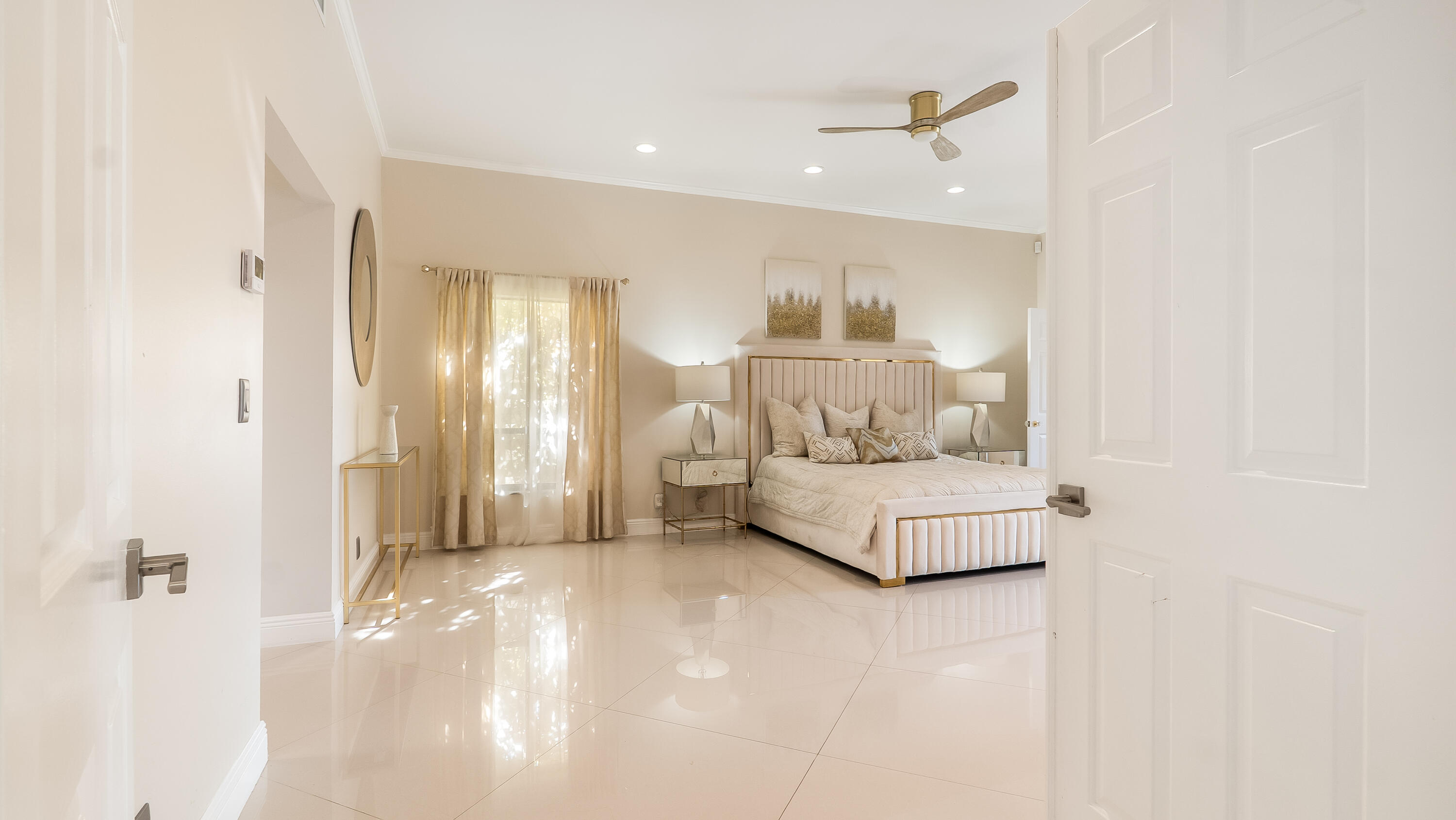 10571 Boca Woods Lane Boca Raton, FL 33428 - Photo 15 of 81 a living room with furniture and a table