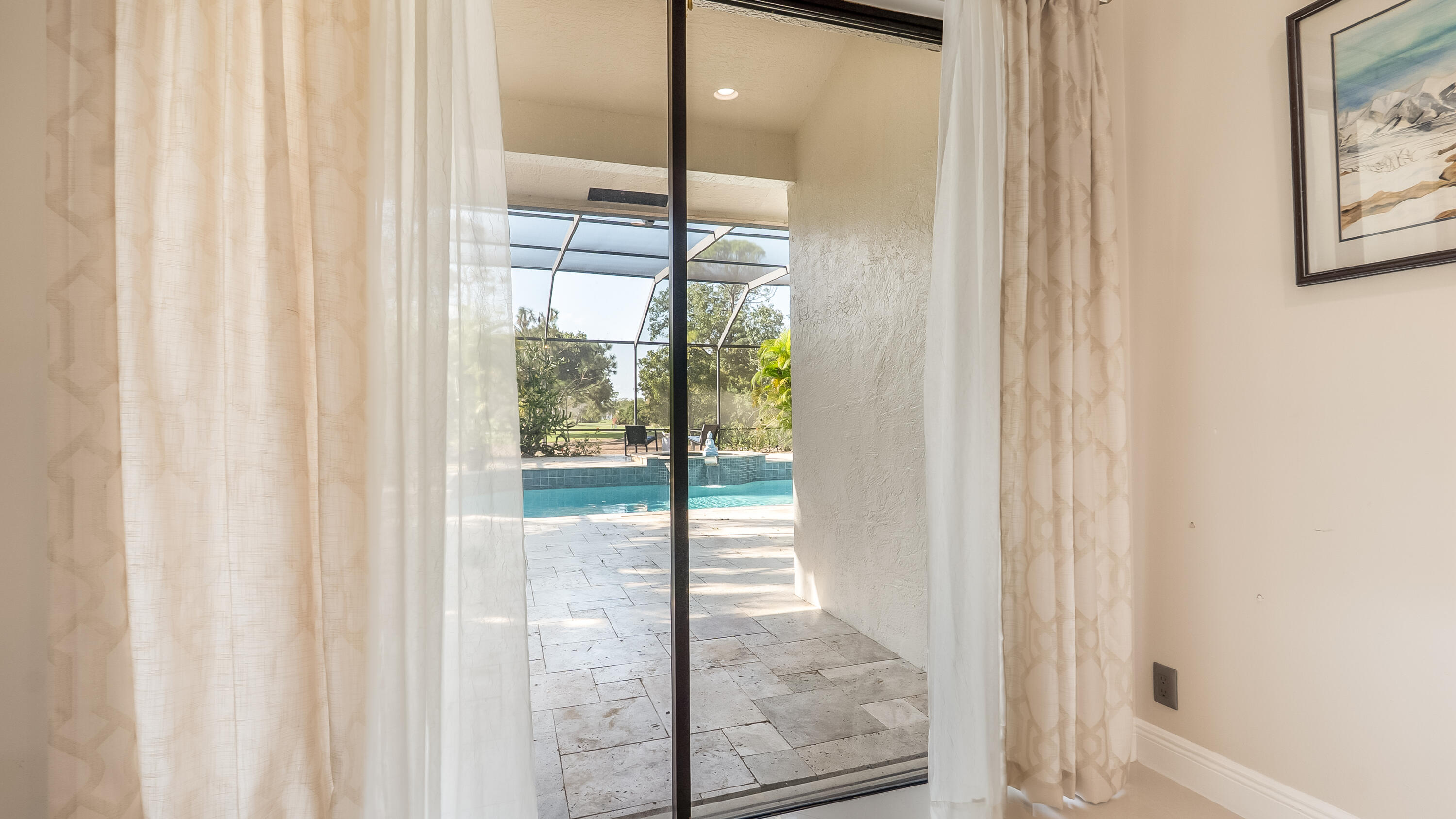 10571 Boca Woods Lane Boca Raton, FL 33428 - Photo 25 of 81 a view of a glass door with a glass door