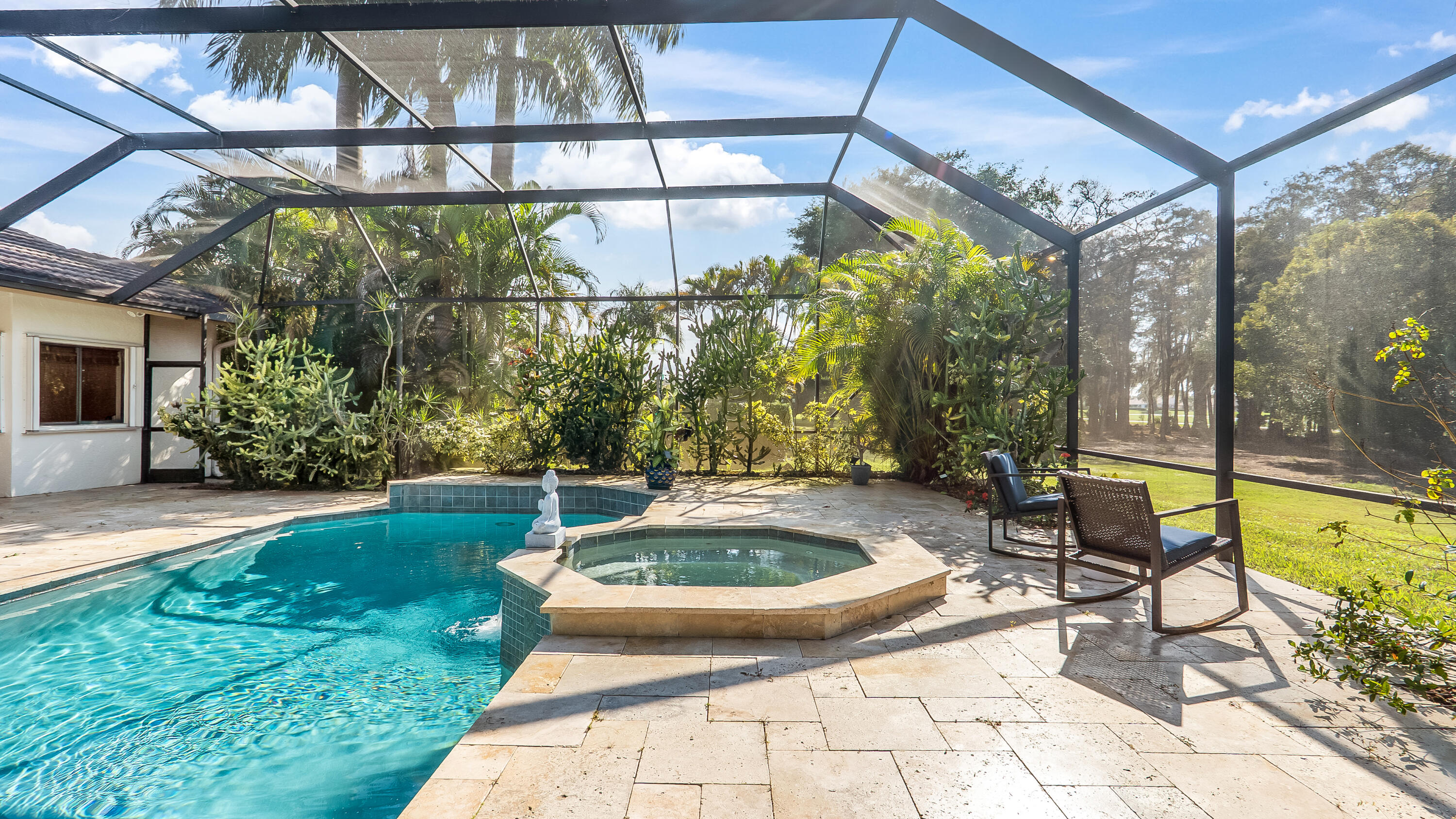 10571 Boca Woods Lane Boca Raton, FL 33428 - Photo 46 of 81 a view of a swimming pool with a patio