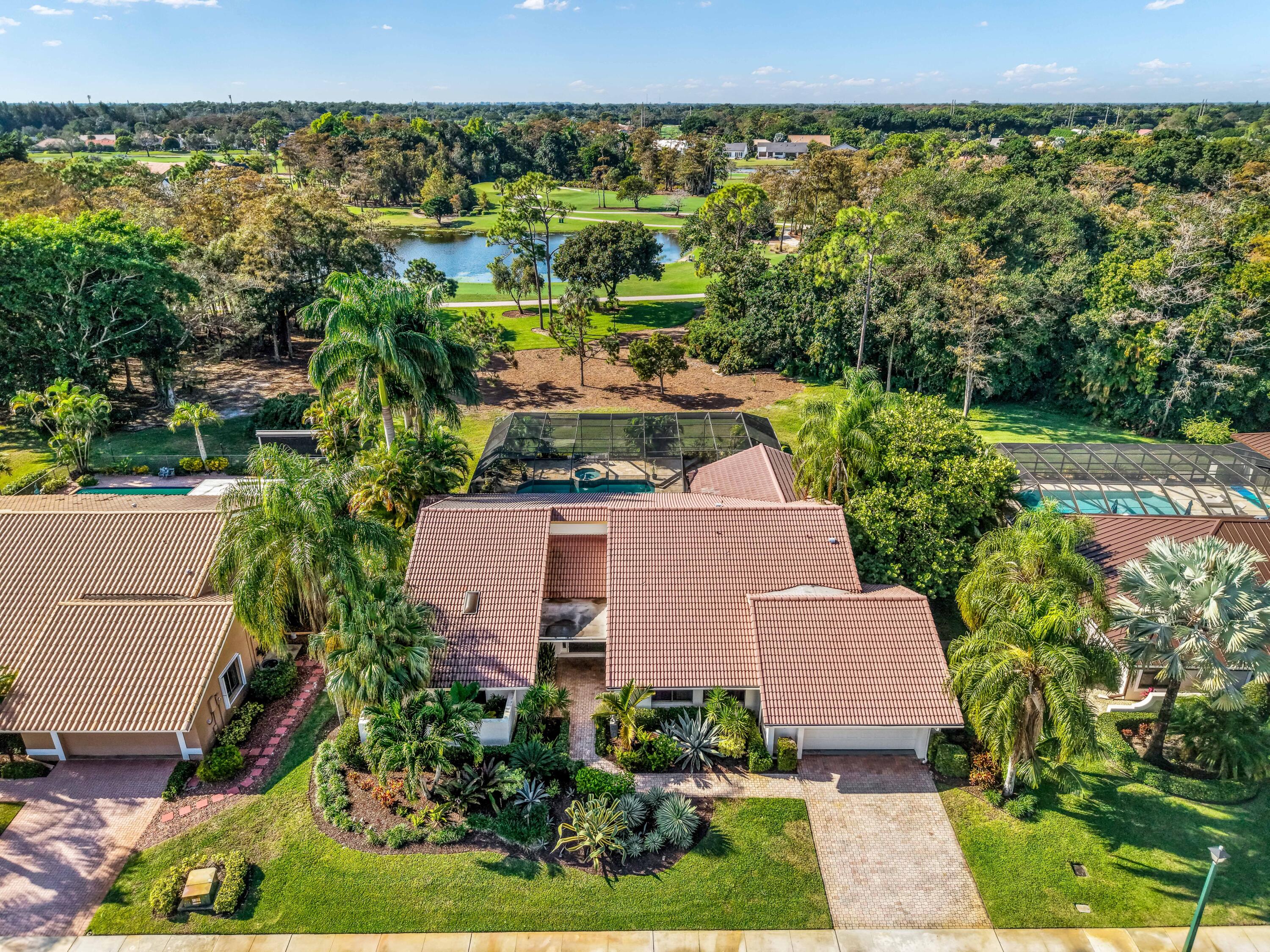 10571 Boca Woods Lane Boca Raton, FL 33428 - Photo 50 of 81 an aerial view of a house with a yard