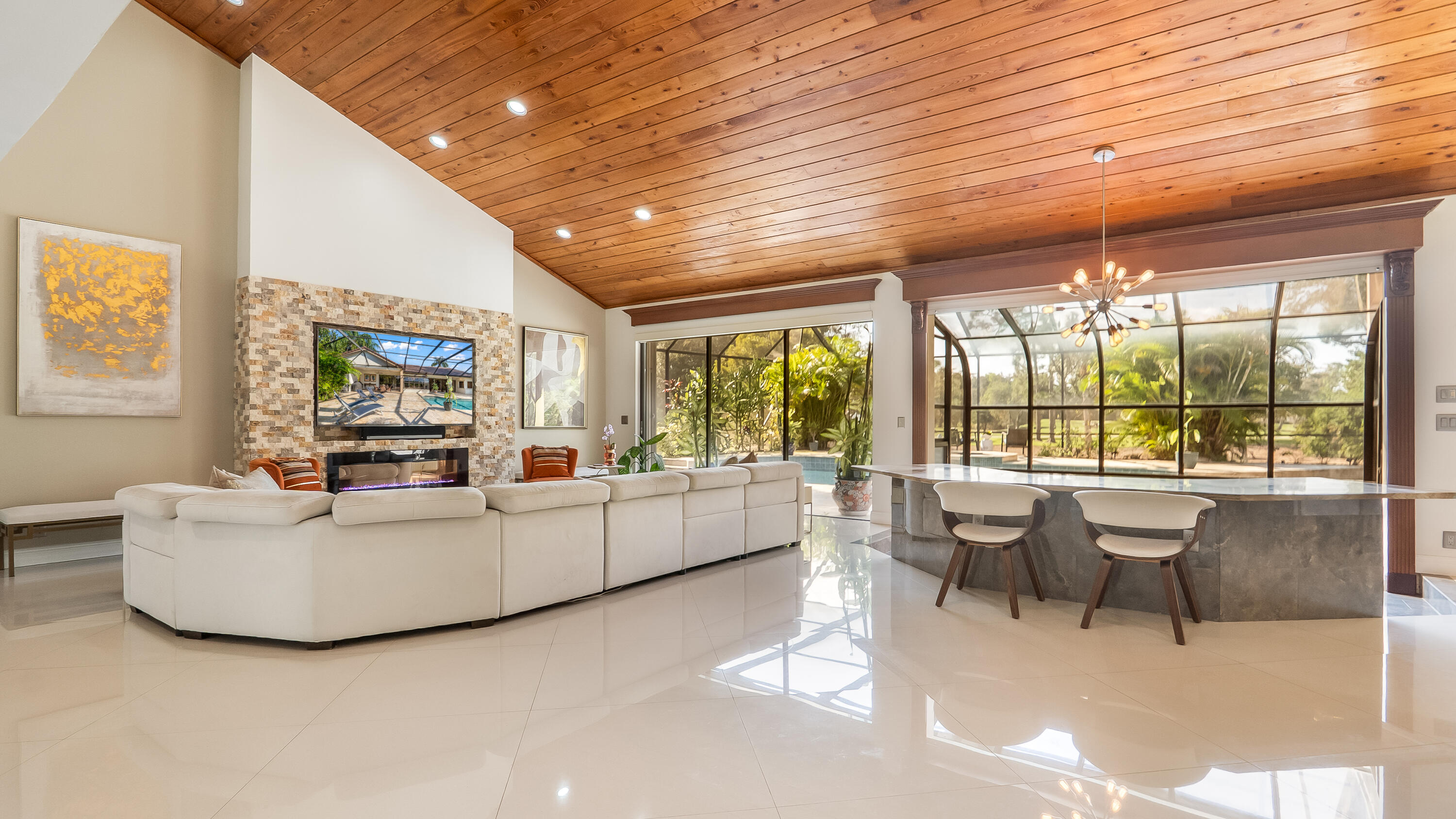 10571 Boca Woods Lane Boca Raton, FL 33428 - Photo 5 of 81 a living room with furniture and a large window