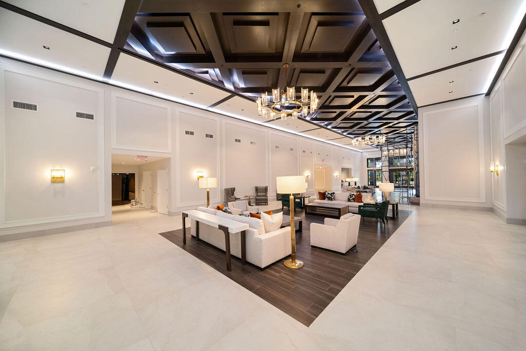 10571 Boca Woods Lane Boca Raton, FL 33428 - Photo 56 of 81 a living room with furniture and fireplace