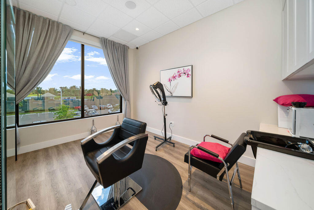 10571 Boca Woods Lane Boca Raton, FL 33428 - Photo 72 of 81 a living room with furniture and a large window