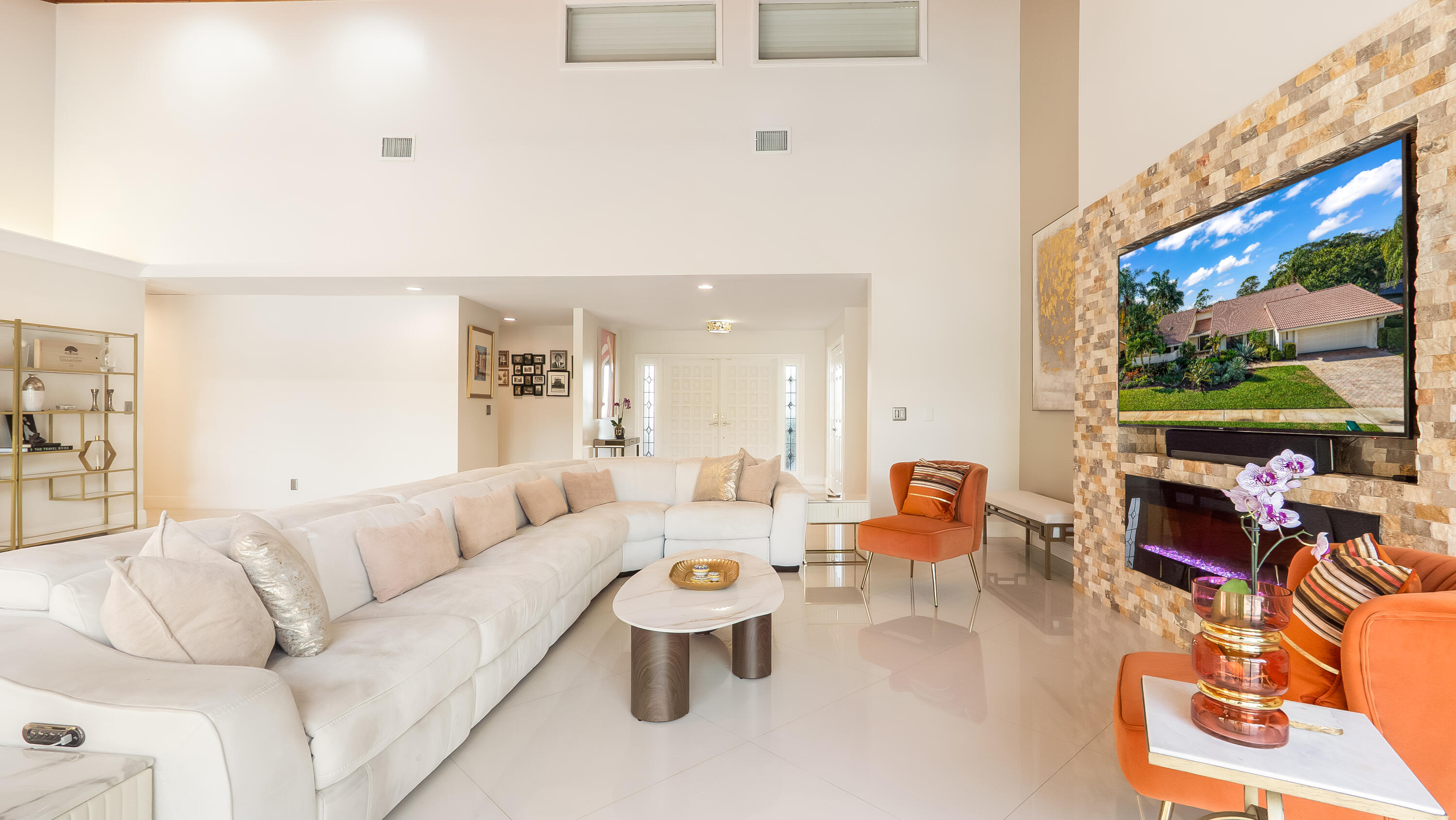 10571 Boca Woods Lane Boca Raton, FL 33428 - Photo 9 of 81 a living room with furniture and a large window