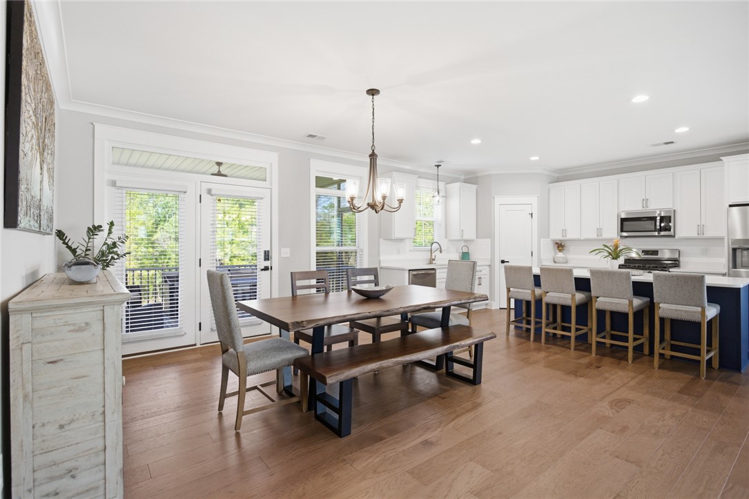 318 Summerall Drive Anderson, SC 29621 - Photo 12 of 42 This bright and open space seamlessly connects the kitchen and dining areas for effortless entertaining.