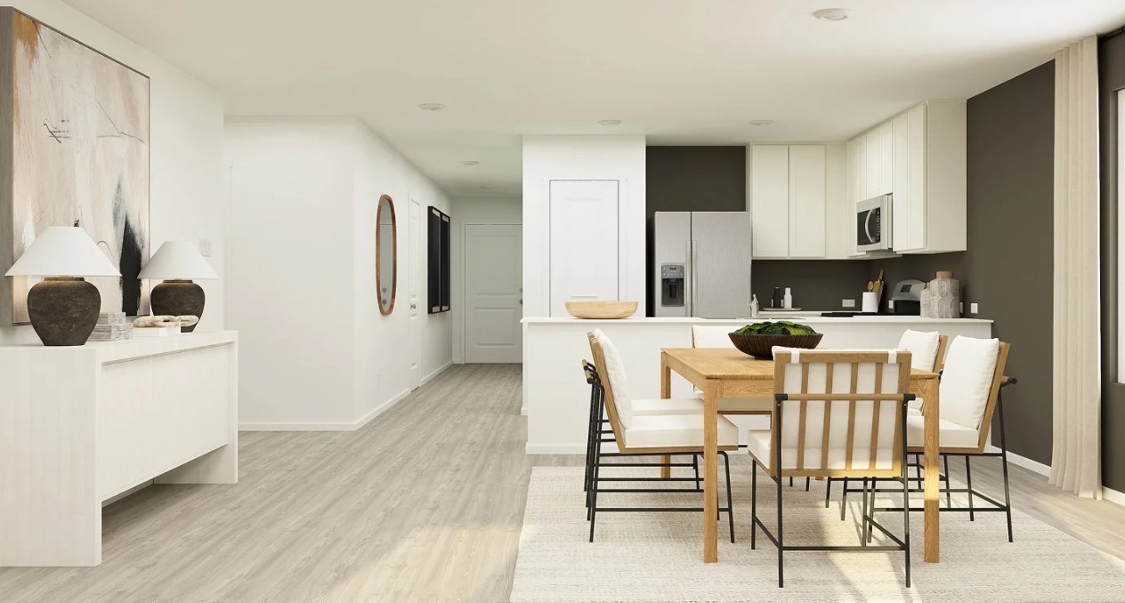 3607 Atlas Pt Lane Angleton, TX 77515 - Photo 5 of 14 a kitchen with a dining table chairs and white cabinets