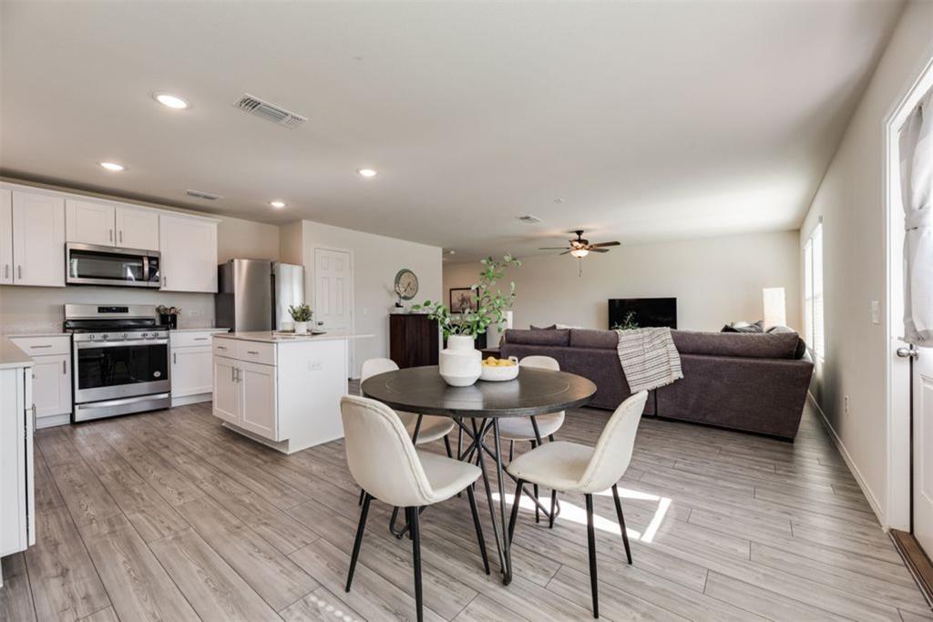 7005 Adderly Road Pilot Point, TX 76258 - Photo 5 of 38 Being connected with your family while you eat wont be an issue in your dining room area