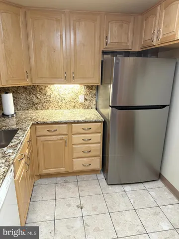 a view of a building with retail shops