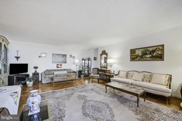 a kitchen with a sink appliances and cabinets