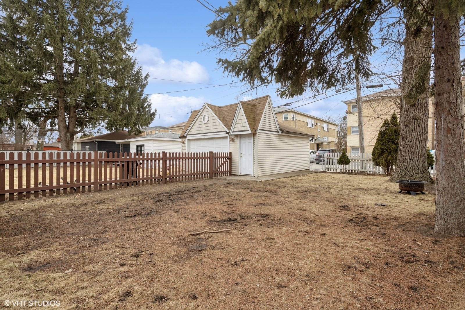 2230 Keystone Avenue North Riverside, IL 60546 - Photo 11 of 12 a view of a white house that has a tree back yard