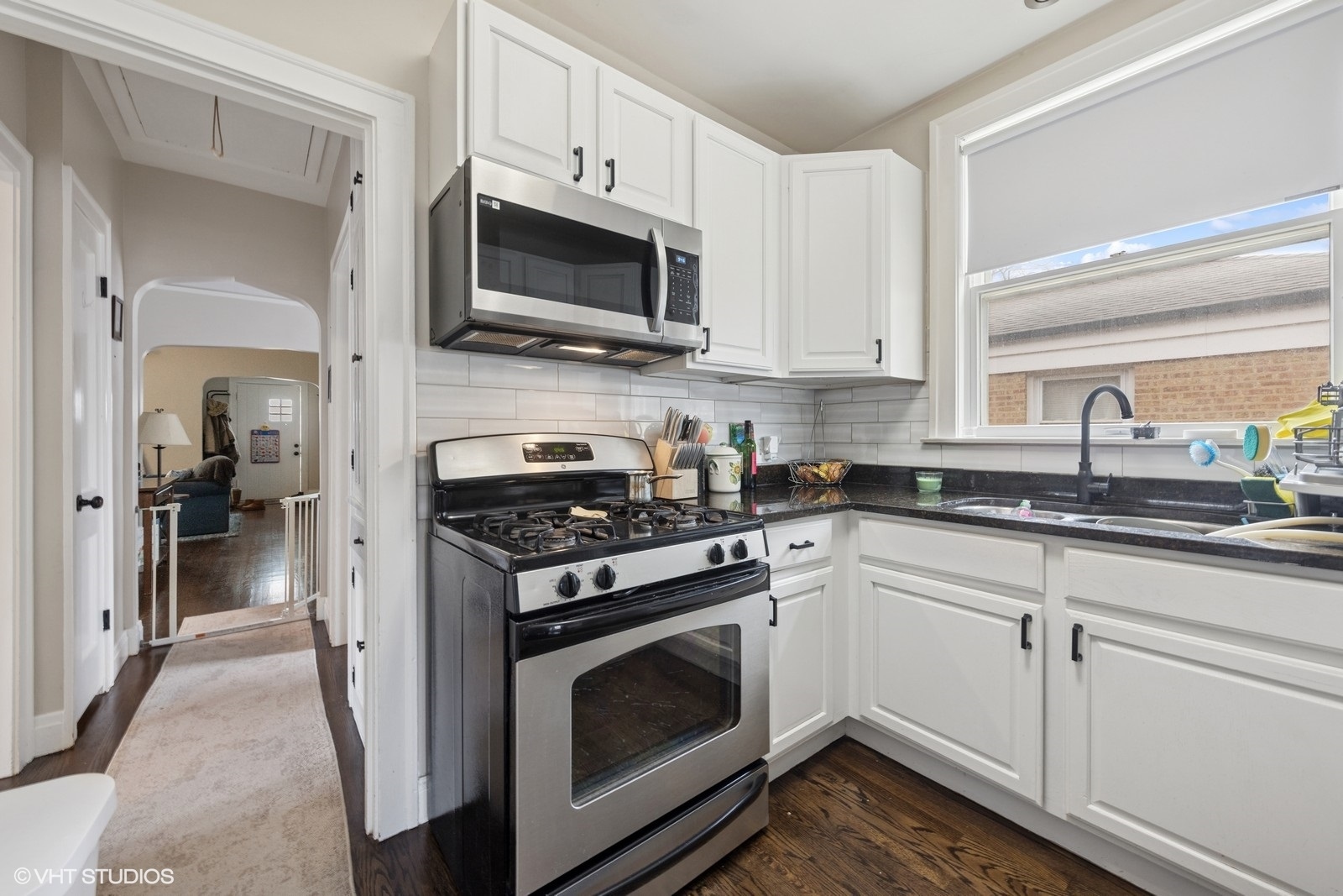 2230 Keystone Avenue North Riverside, IL 60546 - Photo 3 of 12 a kitchen with white cabinets and stainless steel appliances