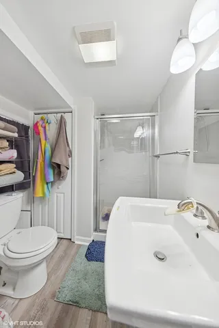 a bathroom with a sink and a shower