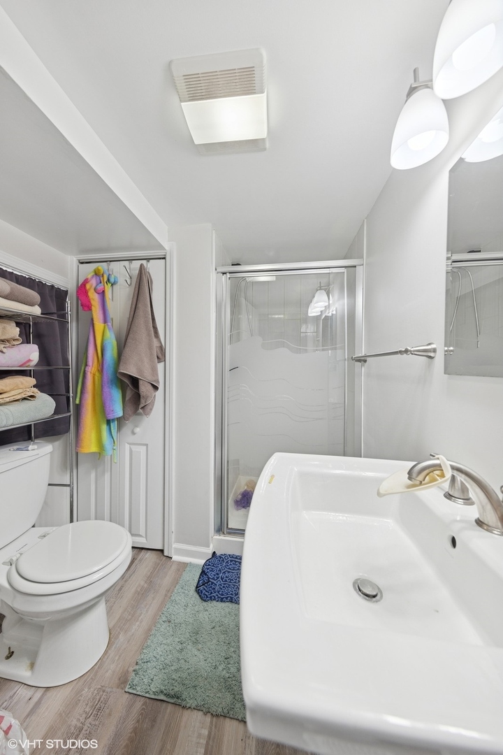 2230 Keystone Avenue North Riverside, IL 60546 - Photo 10 of 12 a bathroom with a sink and a shower