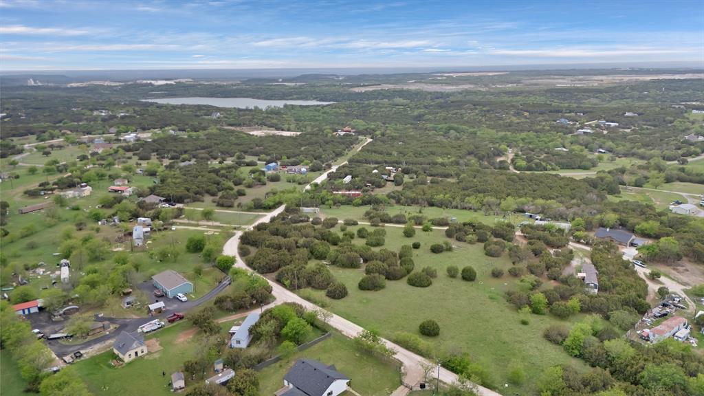 9112 Valley View Court Cleburne, TX 76033 - Photo 2 of 13 an aerial view of residential houses with outdoor space