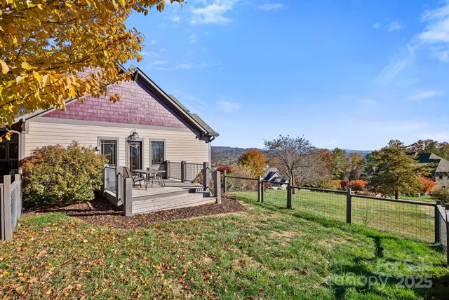 a view of a balcony with furniture