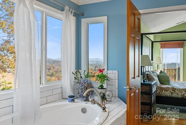 a bathroom with 2 sink and a mirror