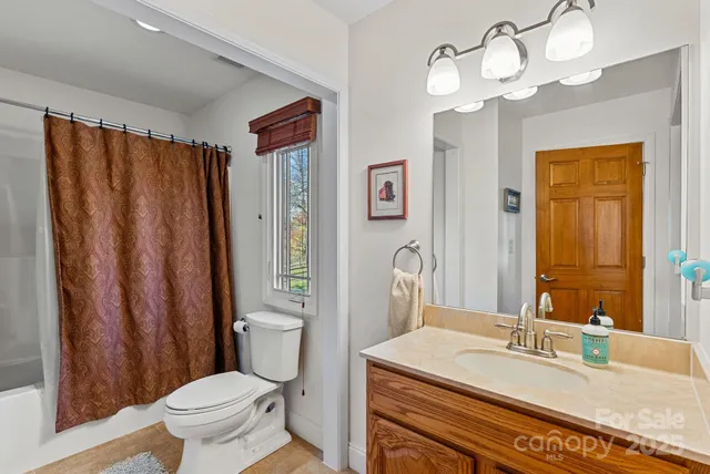 a view of a livingroom with a staircase
