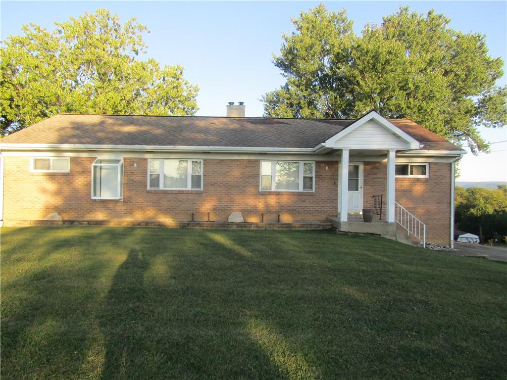 32 Kaider Road Uniontown, PA 15401 - Photo 1 of 17 a front view of a house with a yard