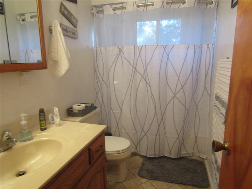 32 Kaider Road Uniontown, PA 15401 - Photo 12 of 17 a bathroom with a sink toilet and shower