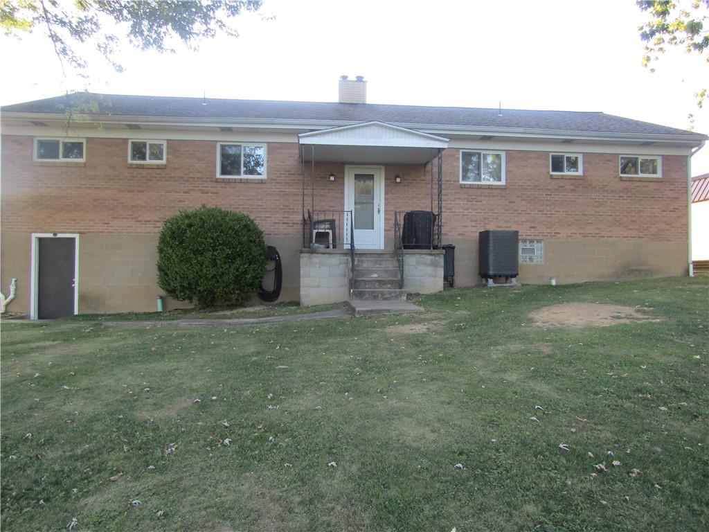 32 Kaider Road Uniontown, PA 15401 - Photo 2 of 17 a view of a house with a yard