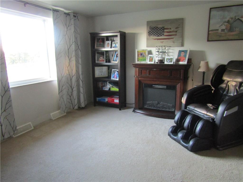 32 Kaider Road Uniontown, PA 15401 - Photo 8 of 17 a living room with furniture and a fireplace