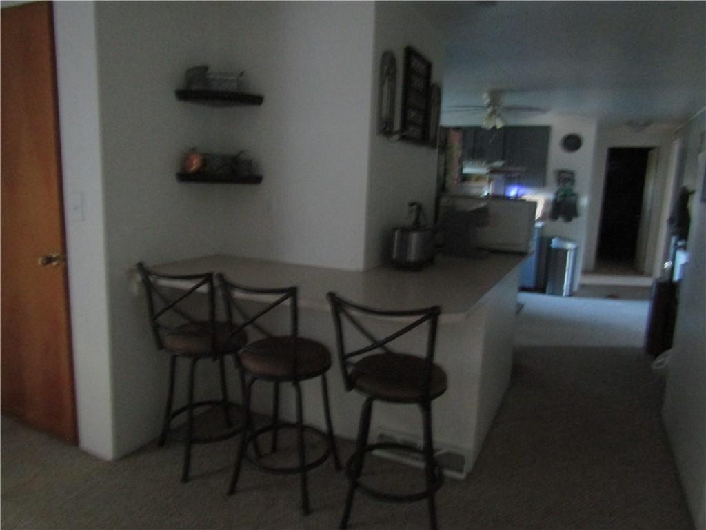 32 Kaider Road Uniontown, PA 15401 - Photo 9 of 17 a dining room with furniture and a kitchen view