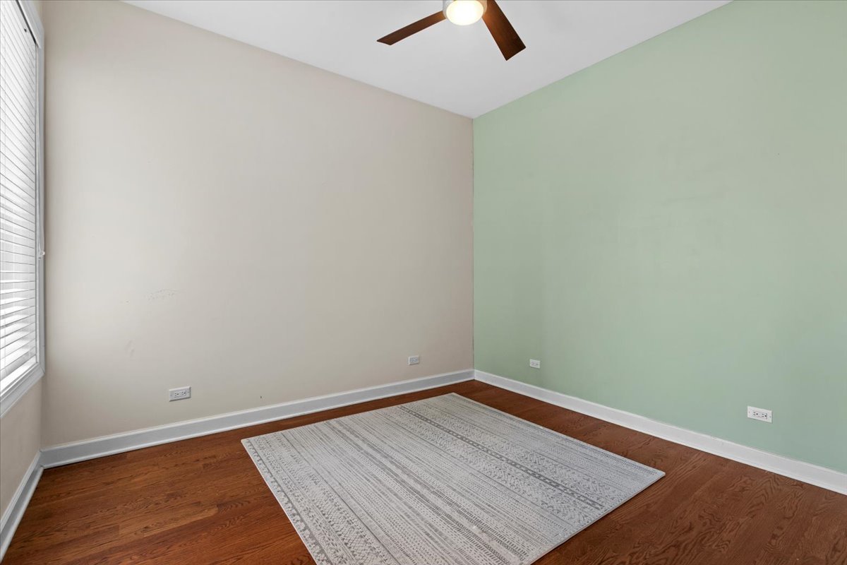 2112 West Rice Street, Unit 2 Chicago, IL 60622 - Photo 17 of 19 an empty room with a window