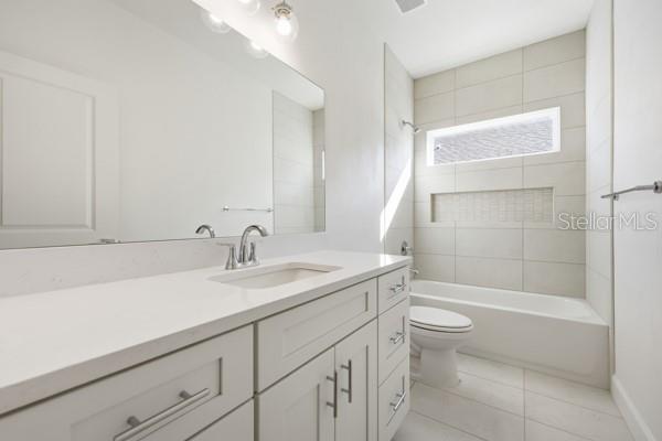 6726 Southwest 10th Lane Gainesville, FL 32607 - Photo 15 of 28 a bathroom with a sink a toilet and shower