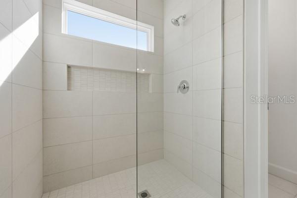 6726 Southwest 10th Lane Gainesville, FL 32607 - Photo 24 of 28 a bathroom with a shower