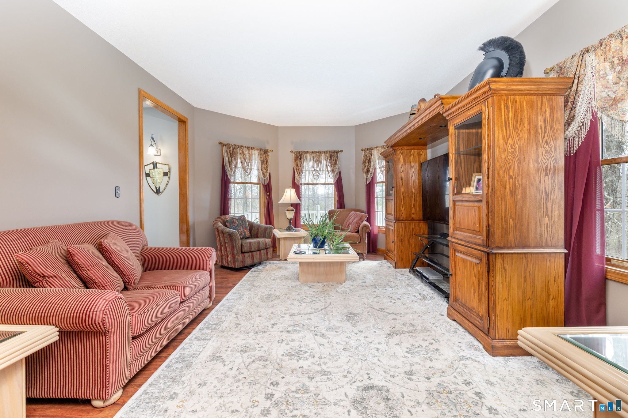 85 Salem Road East Haddam, CT 06415 - Photo 13 of 39 a living room with furniture a refrigerator and a couch