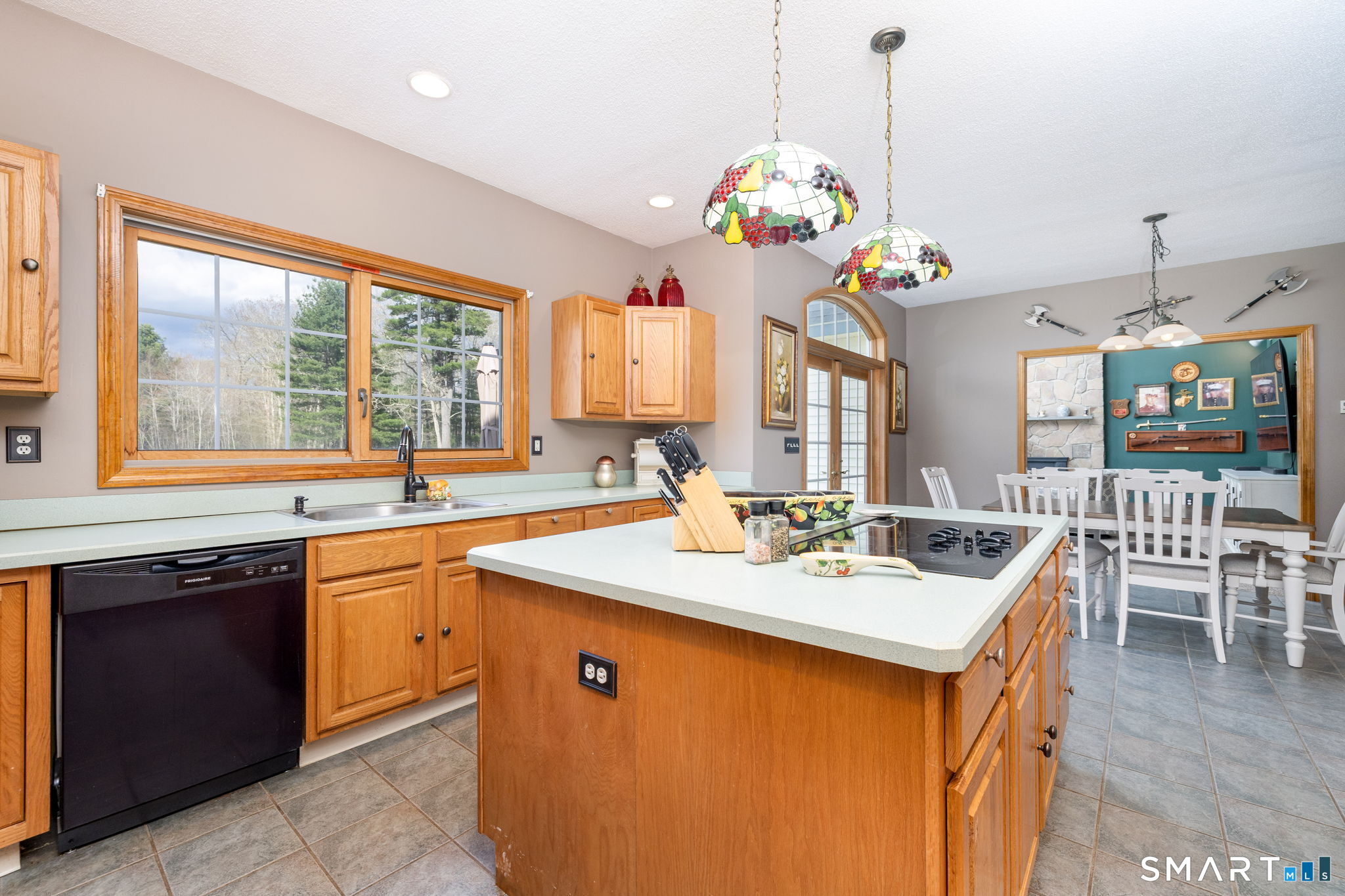 85 Salem Road East Haddam, CT 06415 - Photo 16 of 39 a view of a kitchen center island wooden floor wooden cabinets and a window