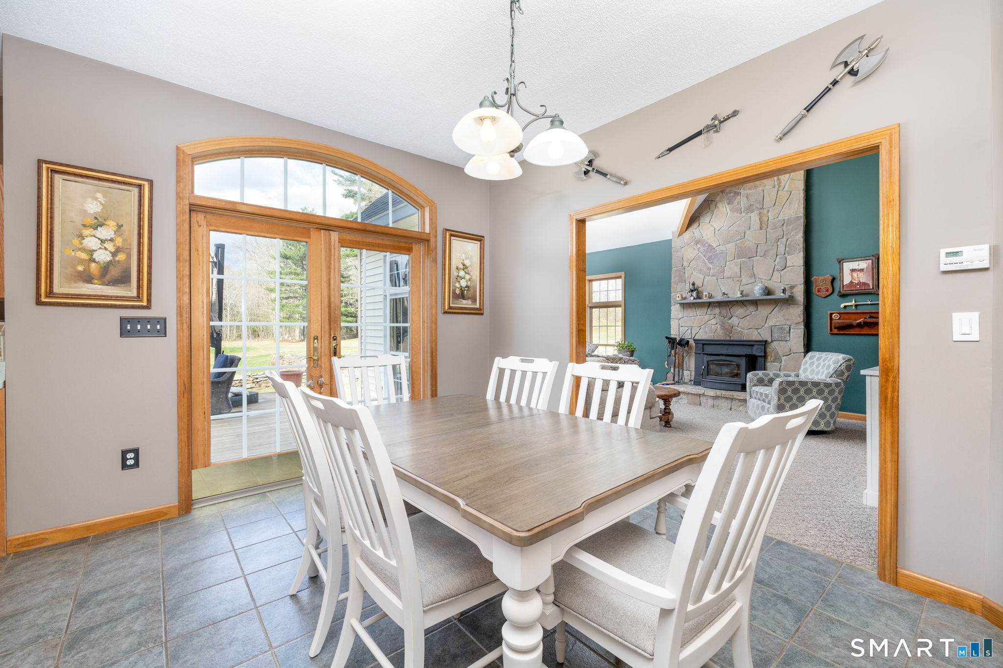 85 Salem Road East Haddam, CT 06415 - Photo 17 of 39 a view of a dining room with furniture a chandelier and wooden floor