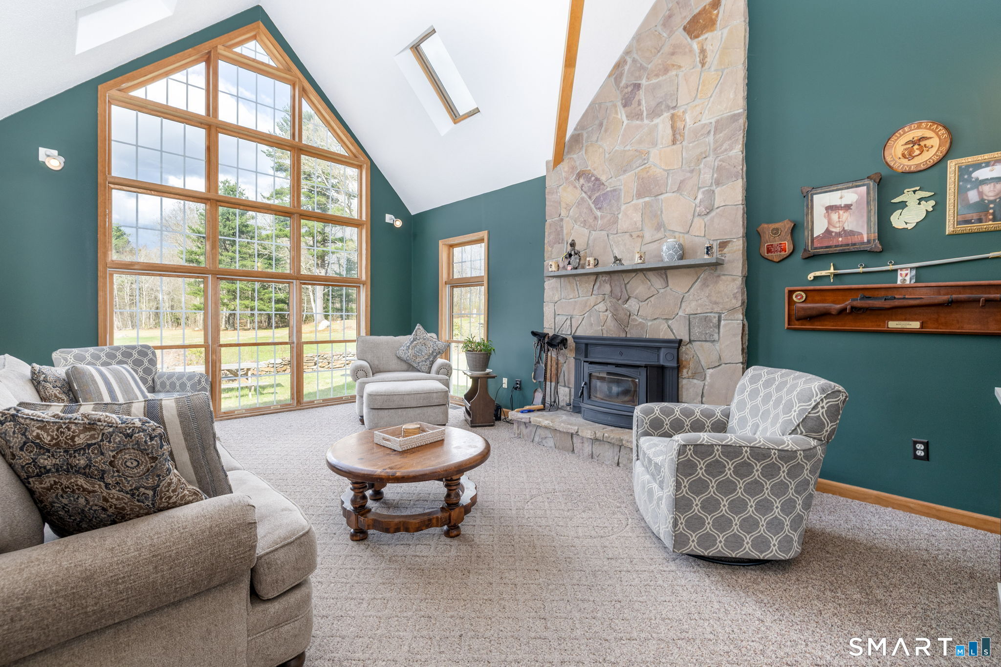85 Salem Road East Haddam, CT 06415 - Photo 18 of 39 a living room with furniture and a fireplace