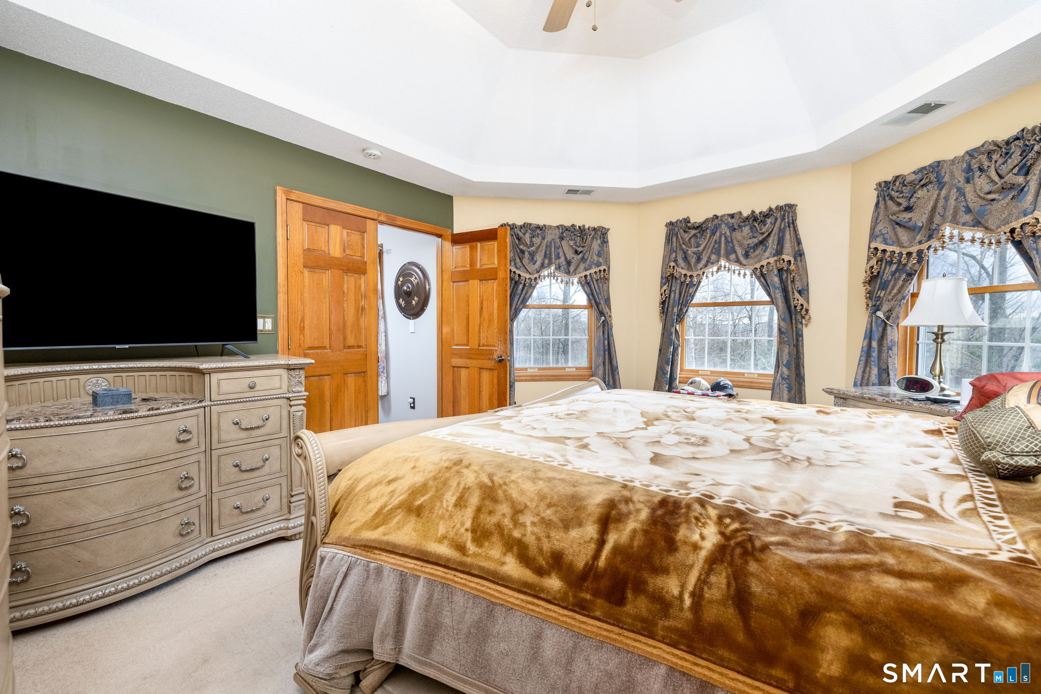 85 Salem Road East Haddam, CT 06415 - Photo 24 of 39 a bedroom with a bed and a flat screen tv
